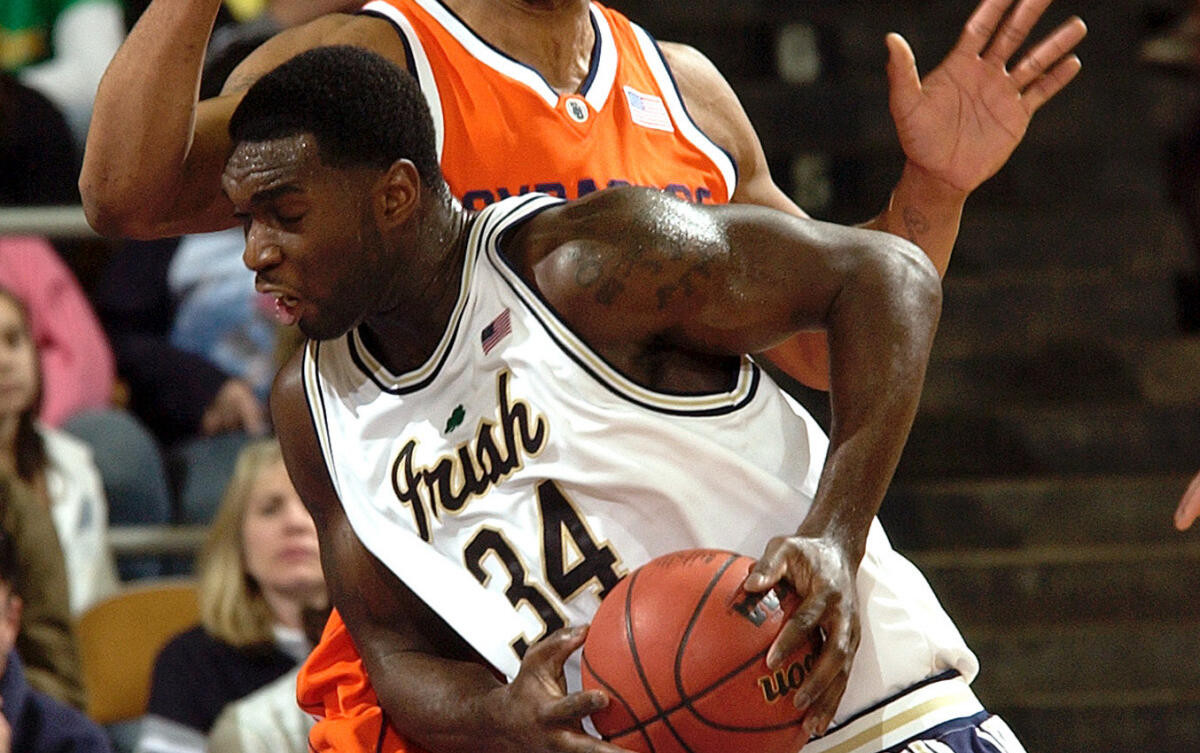 Notre Dame Falls To Syracuse, 88-82 Notre Dame forward Torin Francis drives the lane as Syracuse center Darryl Watkins defends during the first half. (AP Photo/Joe Raymond)