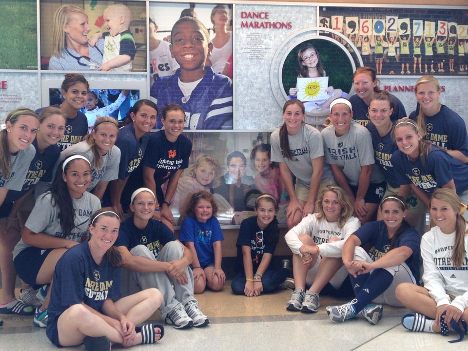 One of the many outreach components that make up Notre Dame softball's Strikeout Cancer initiative has been visits to cancer patients at the Riley Hospital for Children in Indianapolis