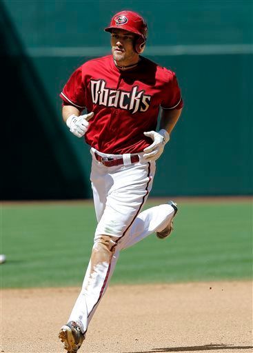 Arizona Diamondbacks' A.J. Pollock rounds the bases after hitting a home run during the fourth inning of a baseball game against the Pittsburgh Pirates, Wednesday, April 10, 2013, in Phoenix. (AP Photo/Matt York)