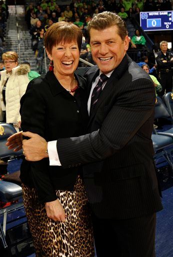 Muffet McGraw and Geno Auriemma before a game in January, 2011