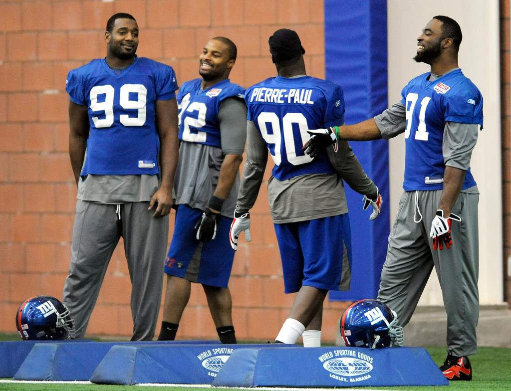 Justin Tuck & Sergio Brown at Super Bowl XLVI (AP)