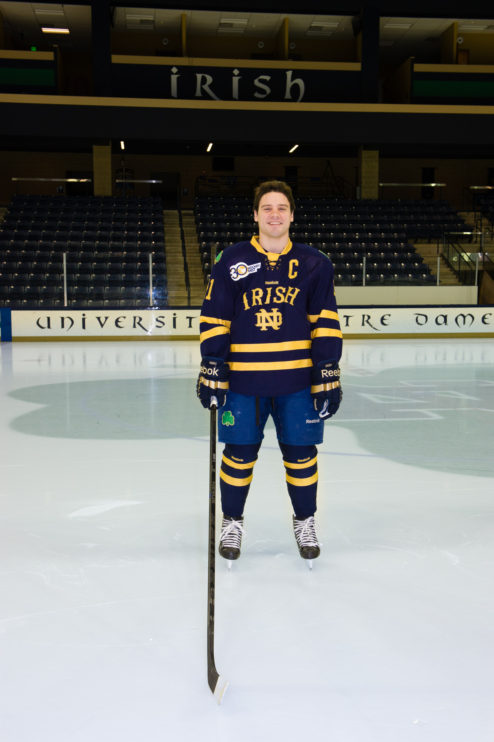 Irish Hockey To Wear Special Jerseys At Frozen Fenway Senior captain Jeff Costello models the jersey that Notre Dame will wear on Jan. 4, 2014 at Frozen Fenway.