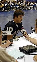 Sophomore quarterback Brady Quinn was one of several players surrounded by reporters at Media Day on Monday, Aug. 9.