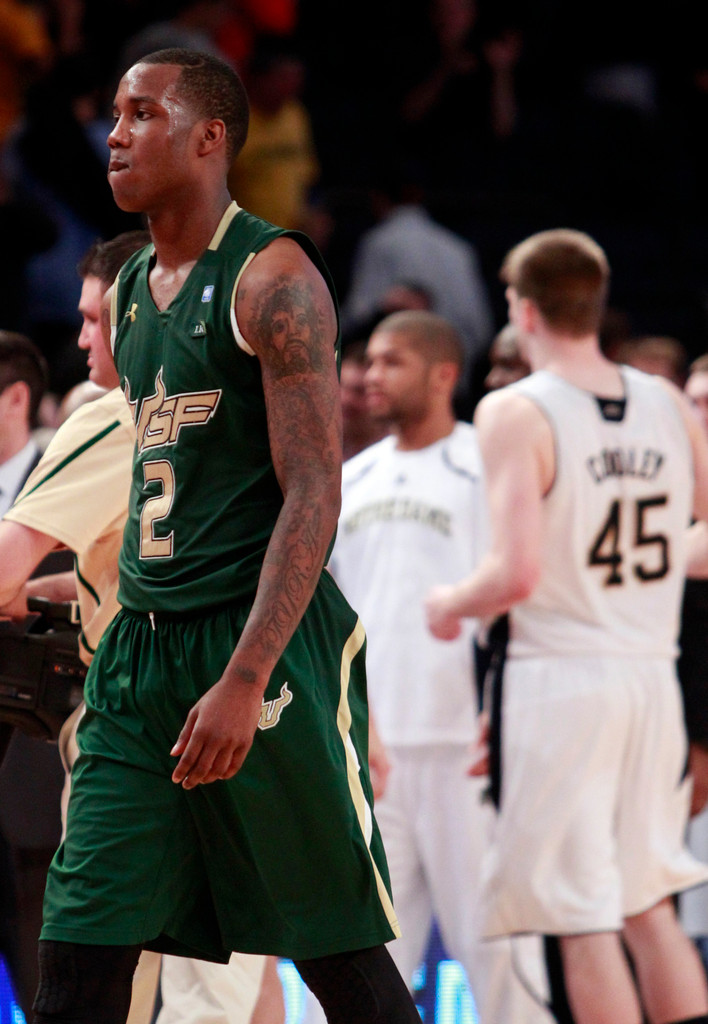 No. 23 Notre Dame Edges USF in OT, 57-53 (AP)