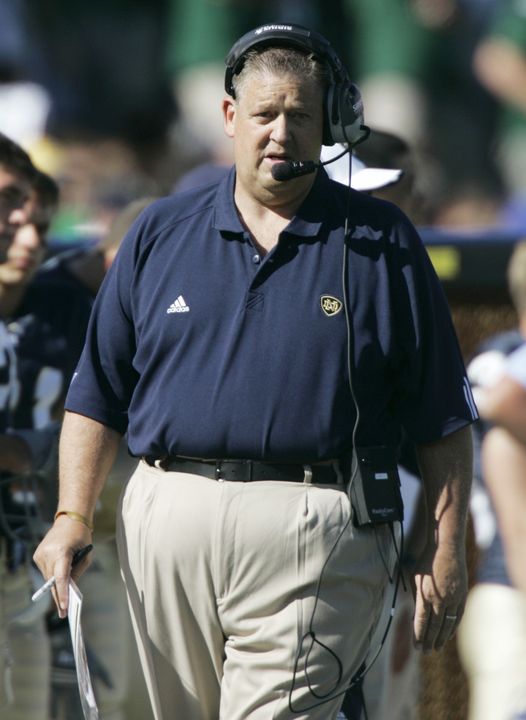 Charlie Weis is visiting U.S. troops with four other college football coaches this week.