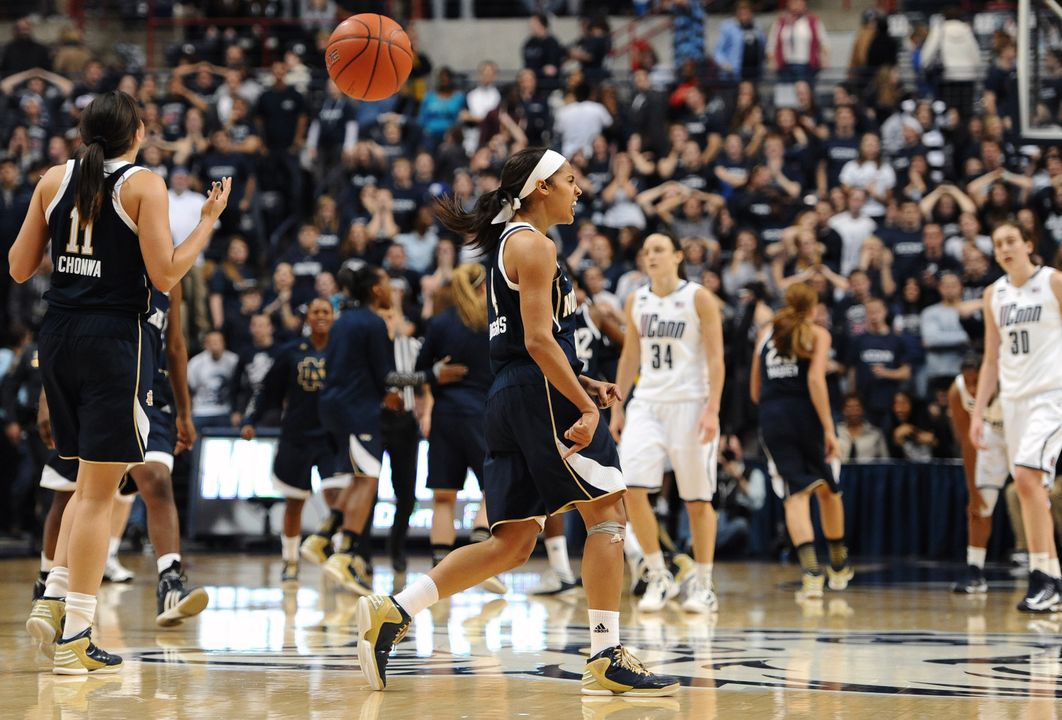 Skylar Diggins celebrates after #5 Notre Dame earned a 73-72 win at #1 Connecticut on Saturday.