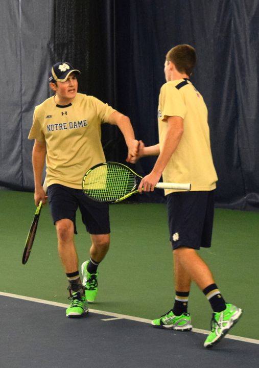 Eric Schnurrenberger, left, is playing a big role for the No. 14 Notre Dame men's tennis team, even as the U.S. collegiate game is a departure from the quiet atmosphere of the game in his native Switzerland.