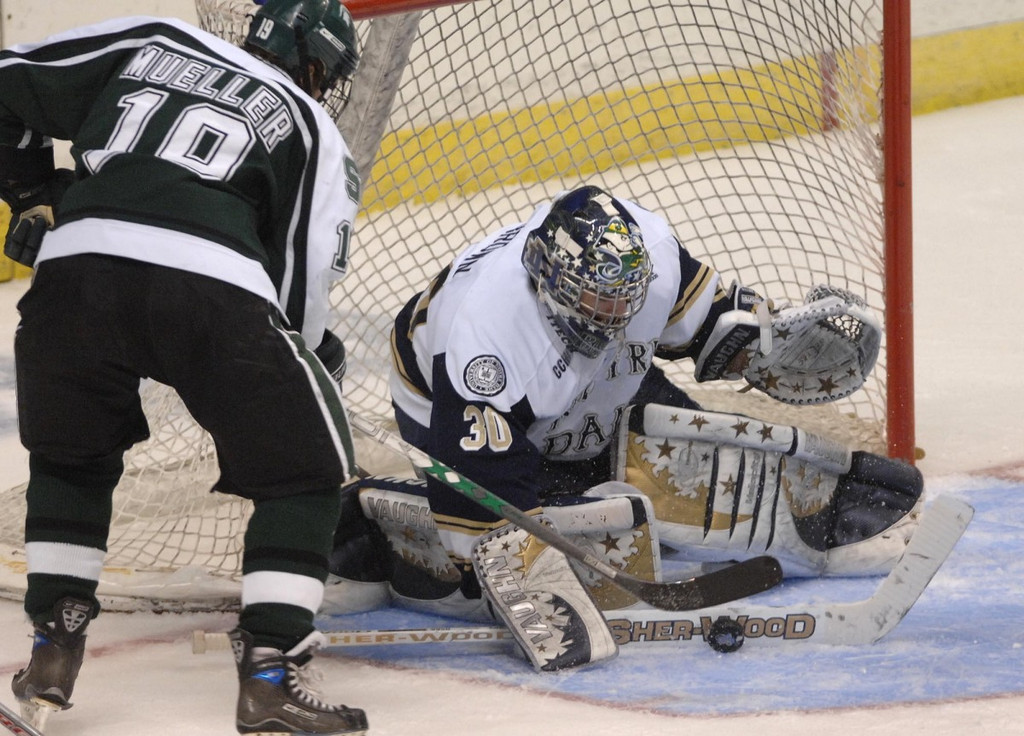 NCAA Quarterfinals - Notre Dame vs. Michigan State (AP photos)