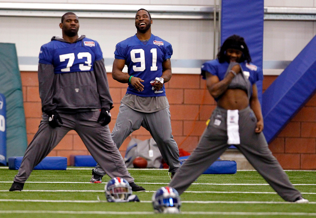 Justin Tuck & Sergio Brown at Super Bowl XLVI (AP)