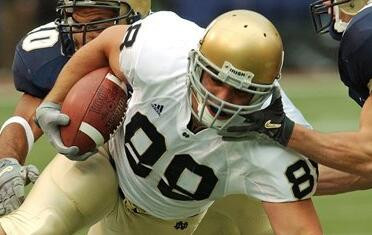 Notre Dame Hands Navy First Loss, 27-9 Anthony Fasano dives for extra yardage during the first quarter Saturday