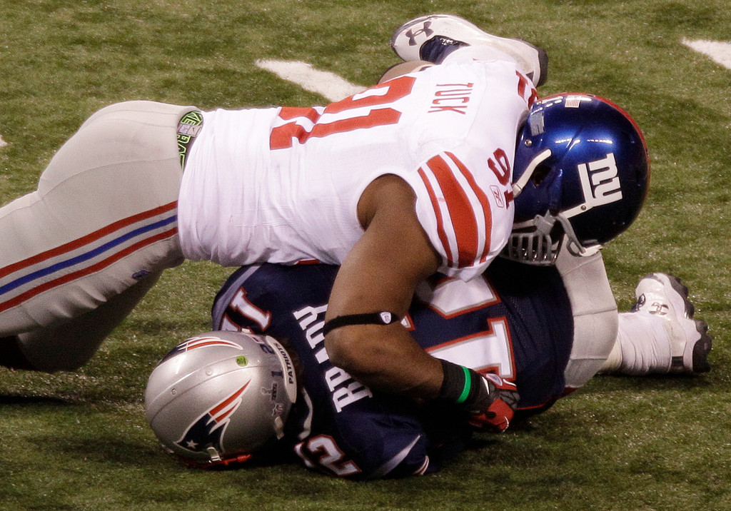 Justin Tuck & Sergio Brown at Super Bowl XLVI (AP)