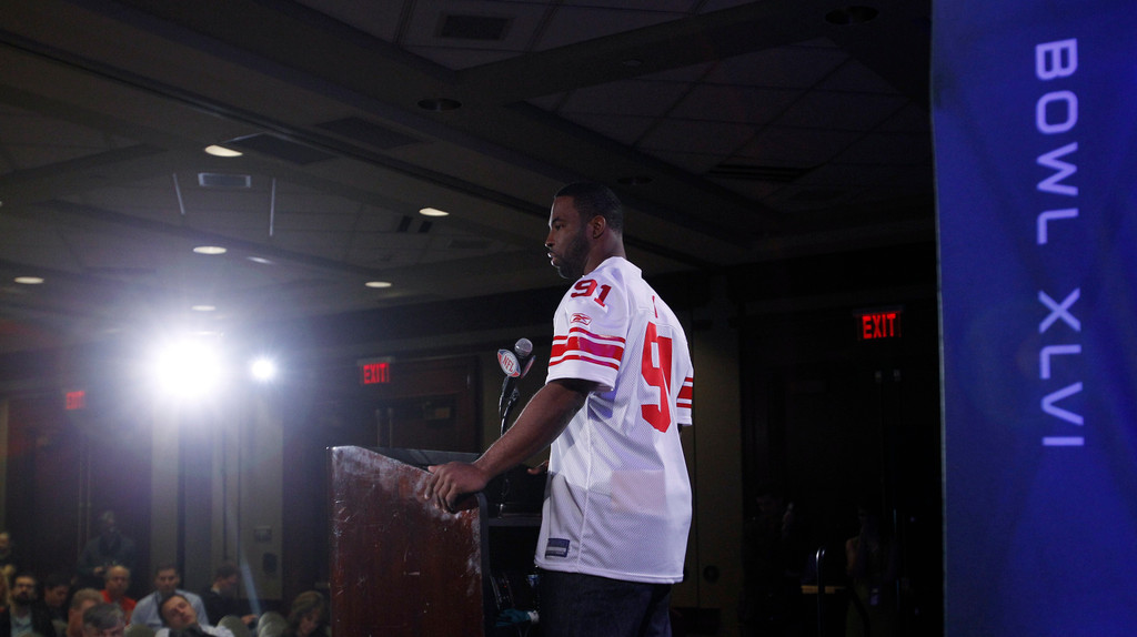 Justin Tuck & Sergio Brown at Super Bowl XLVI (AP)