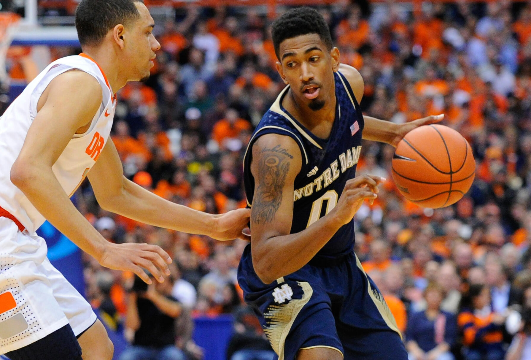 Irish Fall at No. 1 Syracuse, 61-55 Notre Dame Fighting Irish guard Eric Atkins (0) controls the ball. (Rich Barnes-USA TODAY Sports)