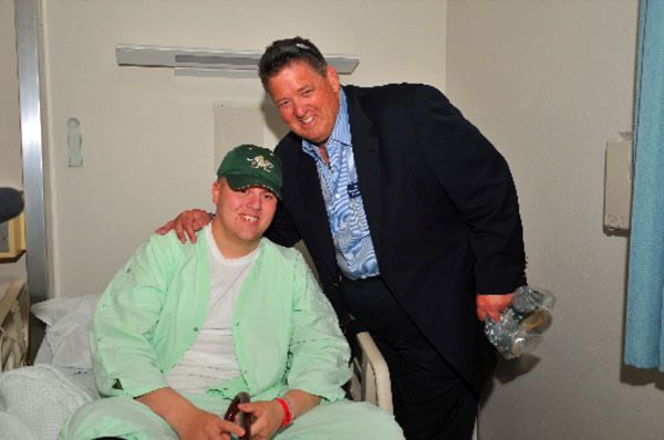 Charlie Weis visited wounded U.S. soldiers at a hospital at an American base in Germany.