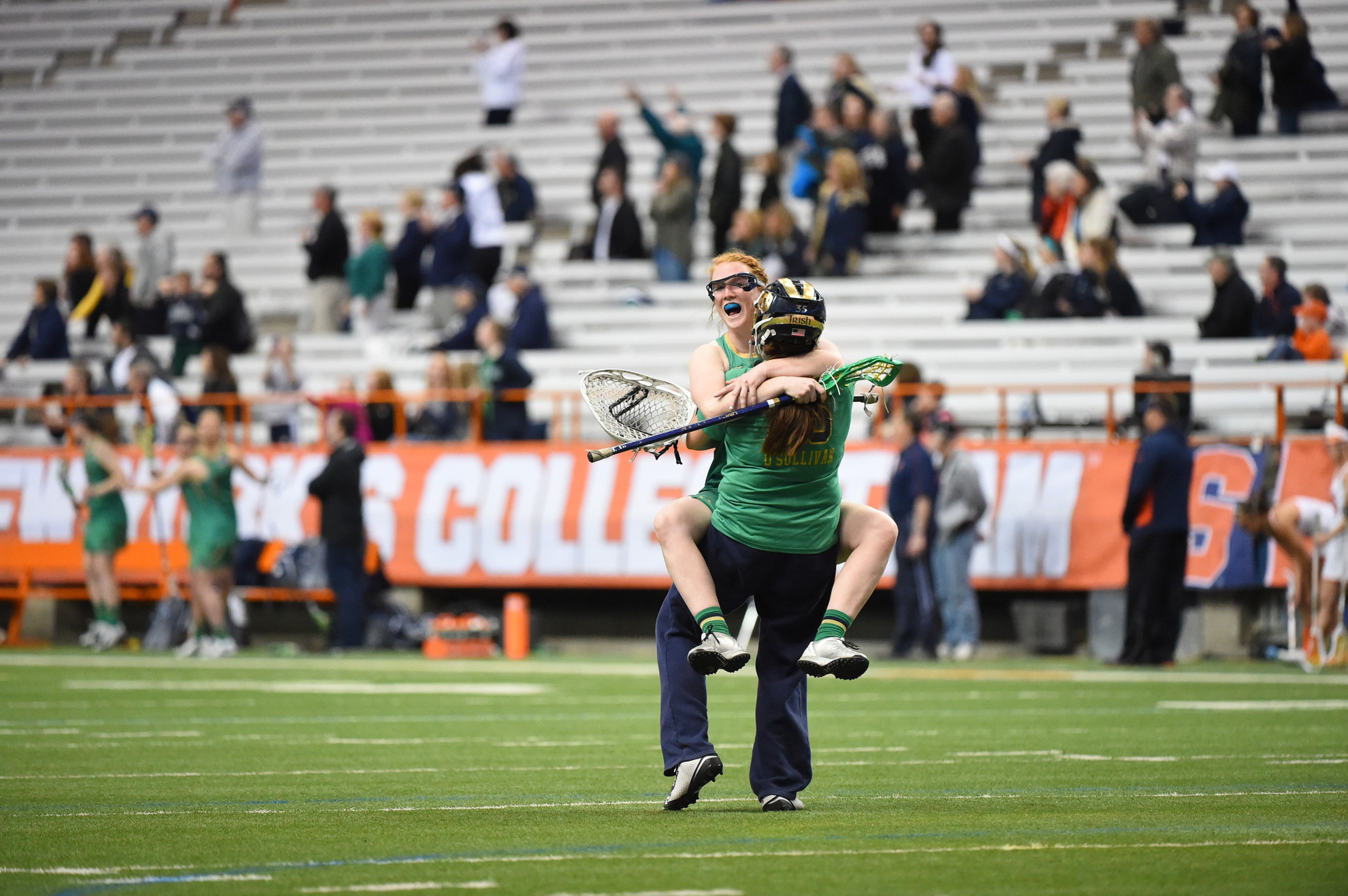 Notre Dame Rides Momentum Into Michigan Game Barbara Sullivan and Liz O'Sullivan, two catalysts of the Irish resurgence, celebrate the win at Syracuse on Tuesday.