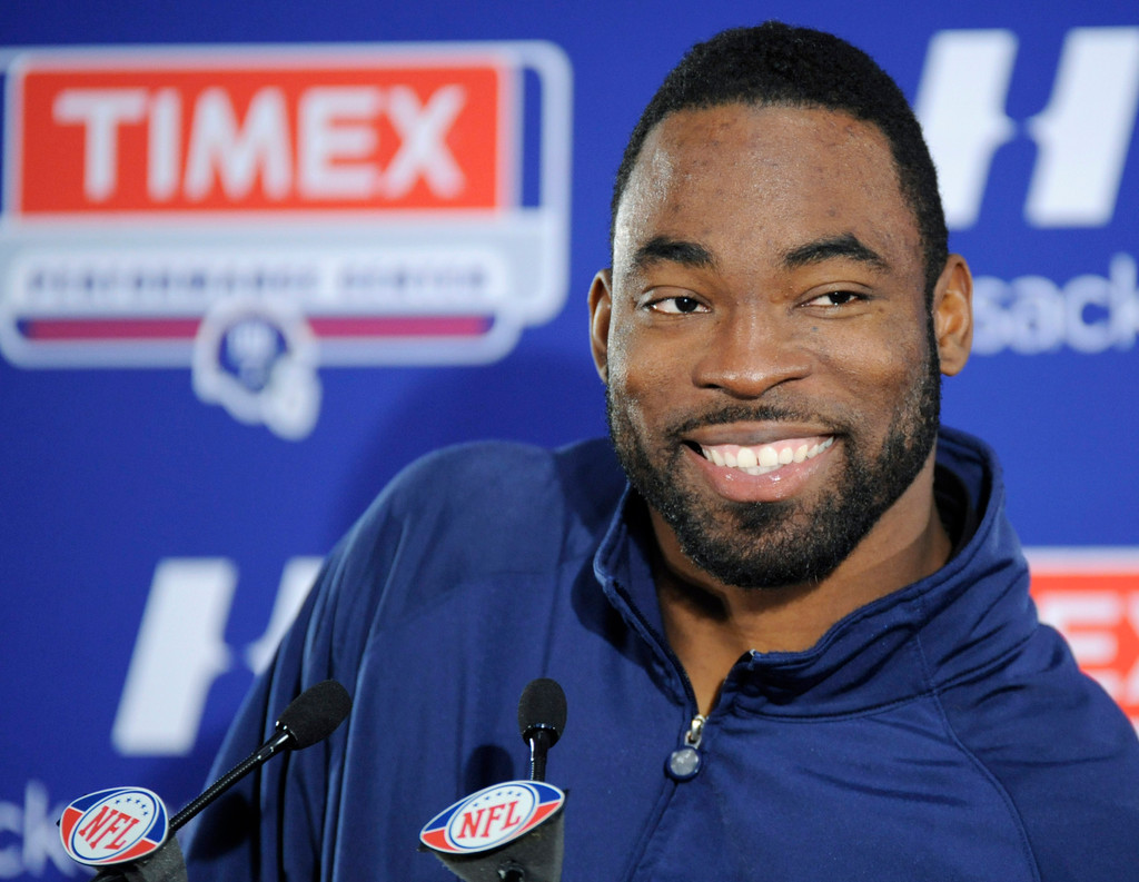 Justin Tuck & Sergio Brown at Super Bowl XLVI (AP)