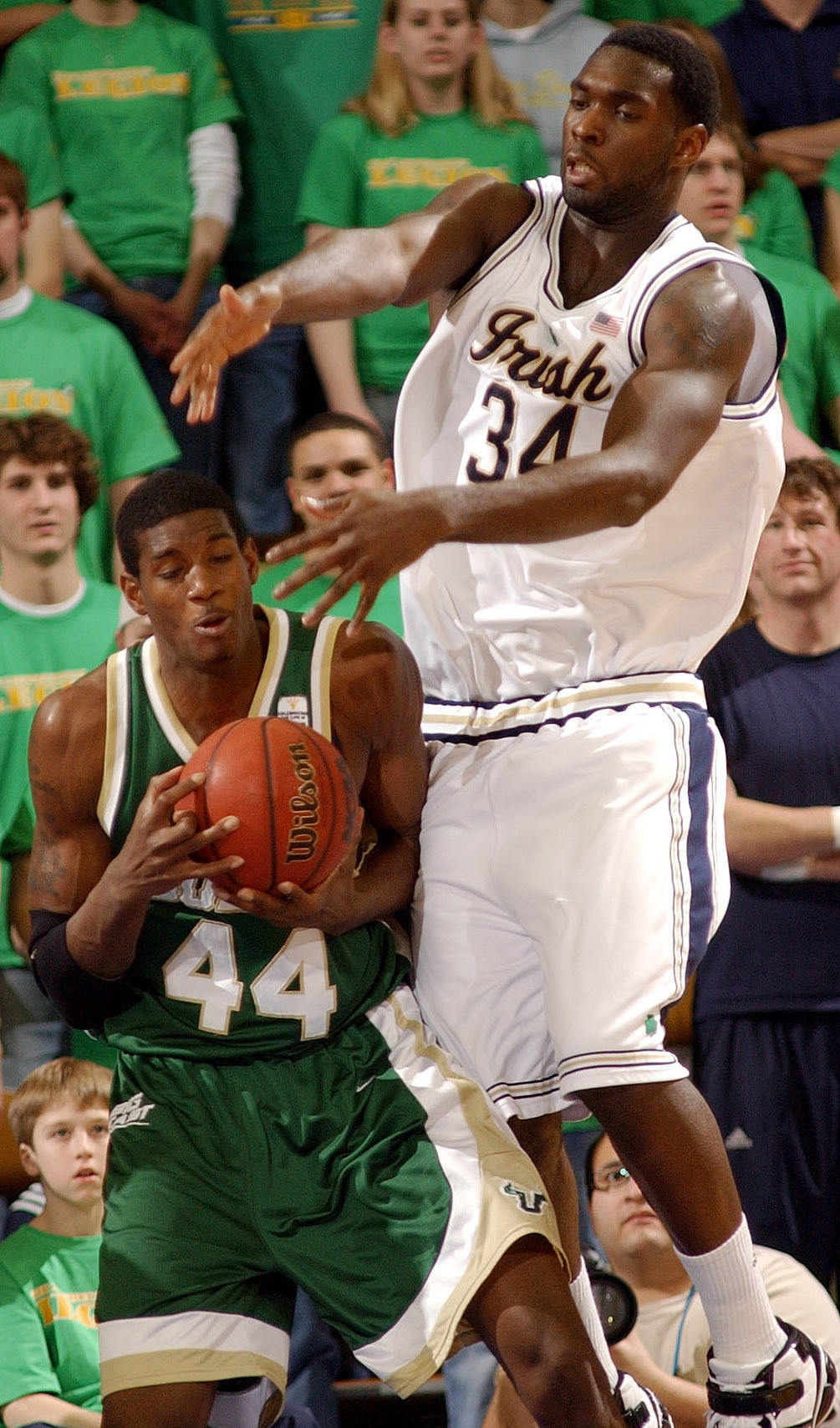 Notre Dame Takes Down South Florida, 62-55 South Florida forward Solomon Jones (44) and Notre Dame forward Torin Francis (34) battle for a rebound. (AP Photo/Joe Raymond)