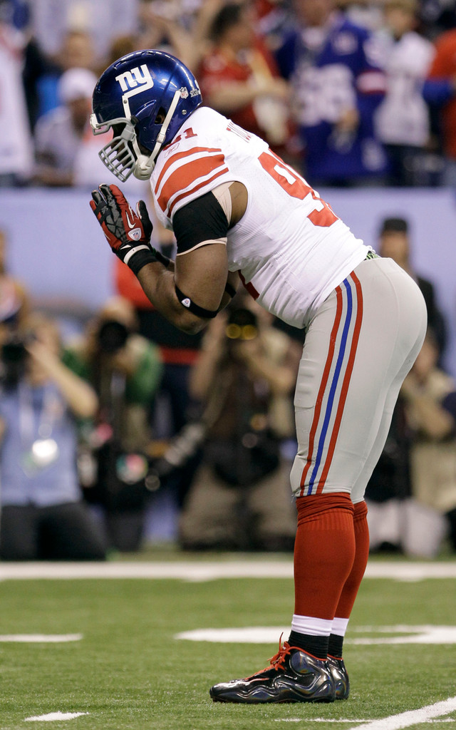 Justin Tuck & Sergio Brown at Super Bowl XLVI (AP)