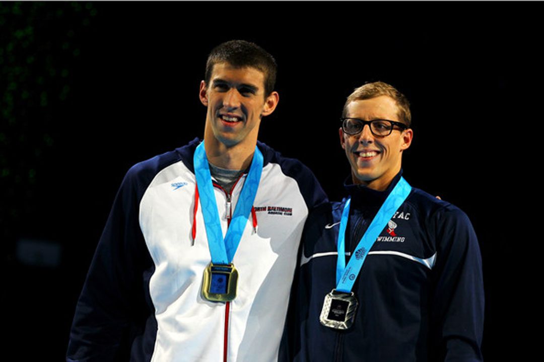 Tyler McGill (right) poses with Michael Phelps (left) after the duo went one and two in the 100m fly at the U.S. Olympic Trials.