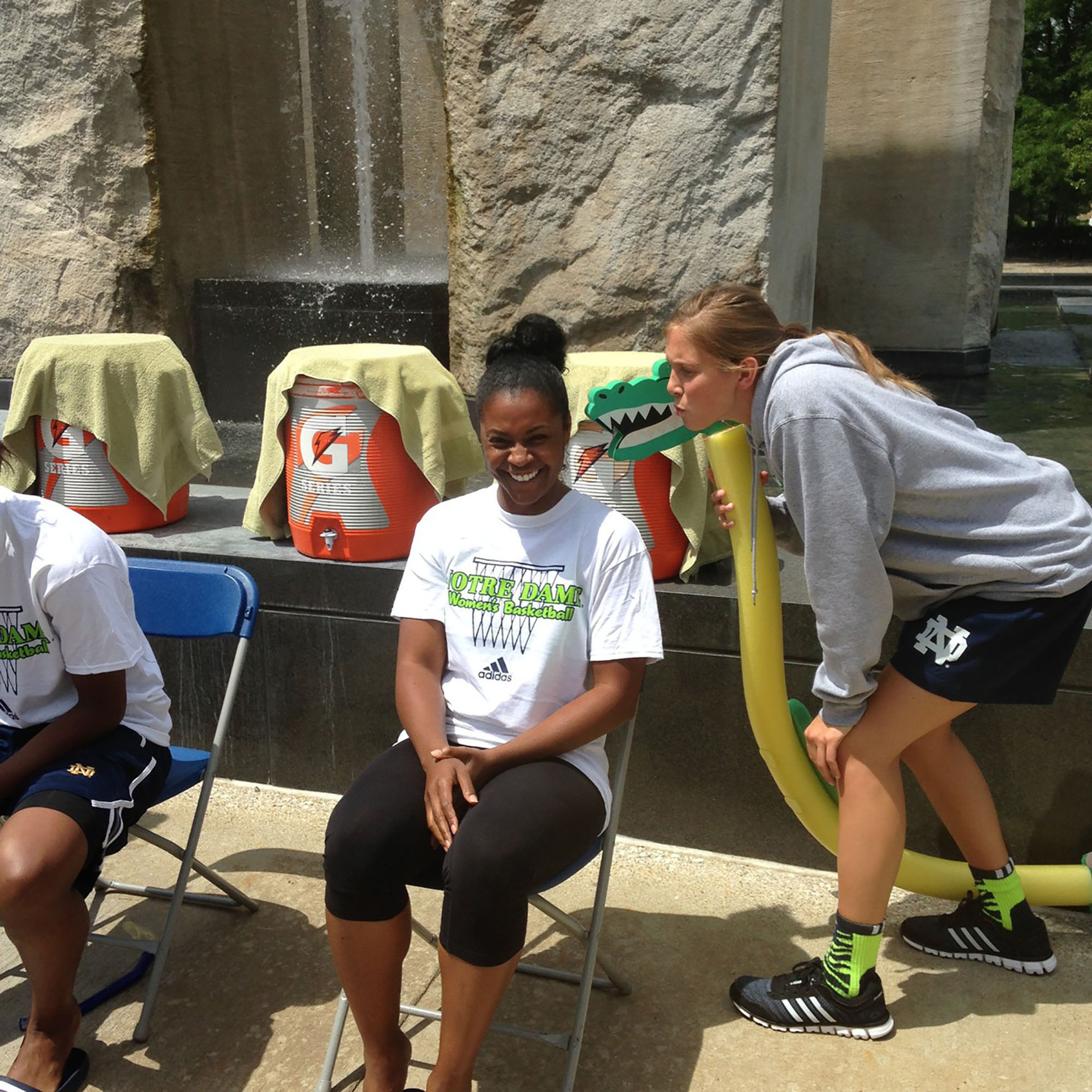 From The Hardwood: Irish Are #Chillin4Charity Channeling her inner Lance Stephenson, senior guard Madison Cable blows in assistant coach Niele Ivey's ear before the Fighting Irish completed their #Chillin4Charity Cold Water Challenge last Sunday.