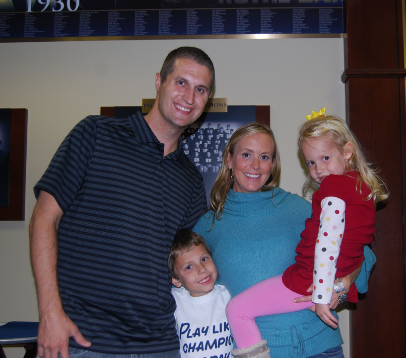 Monogram winner Matt McNew '01 (soccer, football) with his family during the Friday football reception.