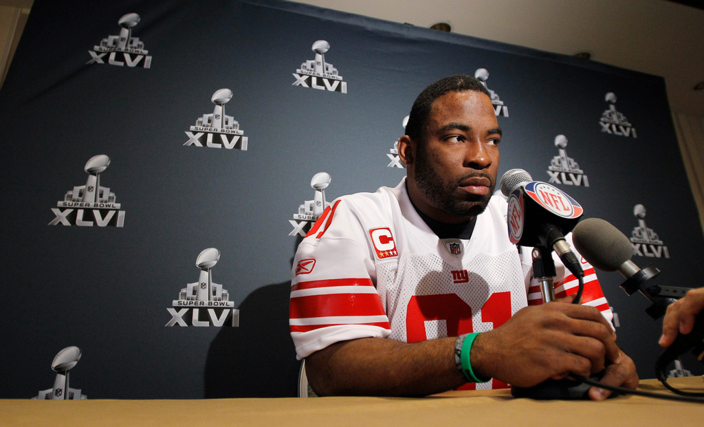 Justin Tuck & Sergio Brown at Super Bowl XLVI (AP)