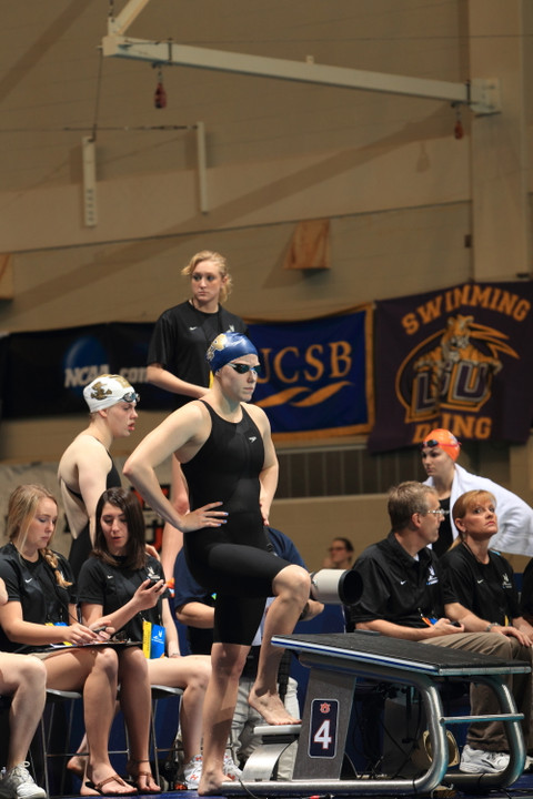 Sophomore Emma Reaney broke the 400 IM and 100 breast school records Saturday.