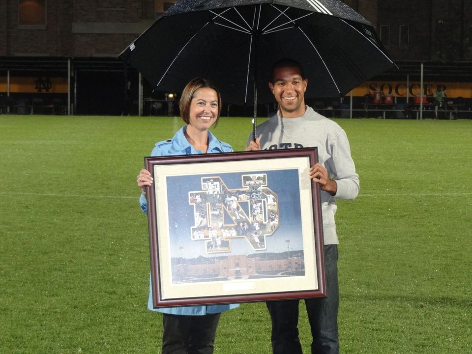 Morrow received a commemorative collage from Monogram Club executive director Beth Hunter