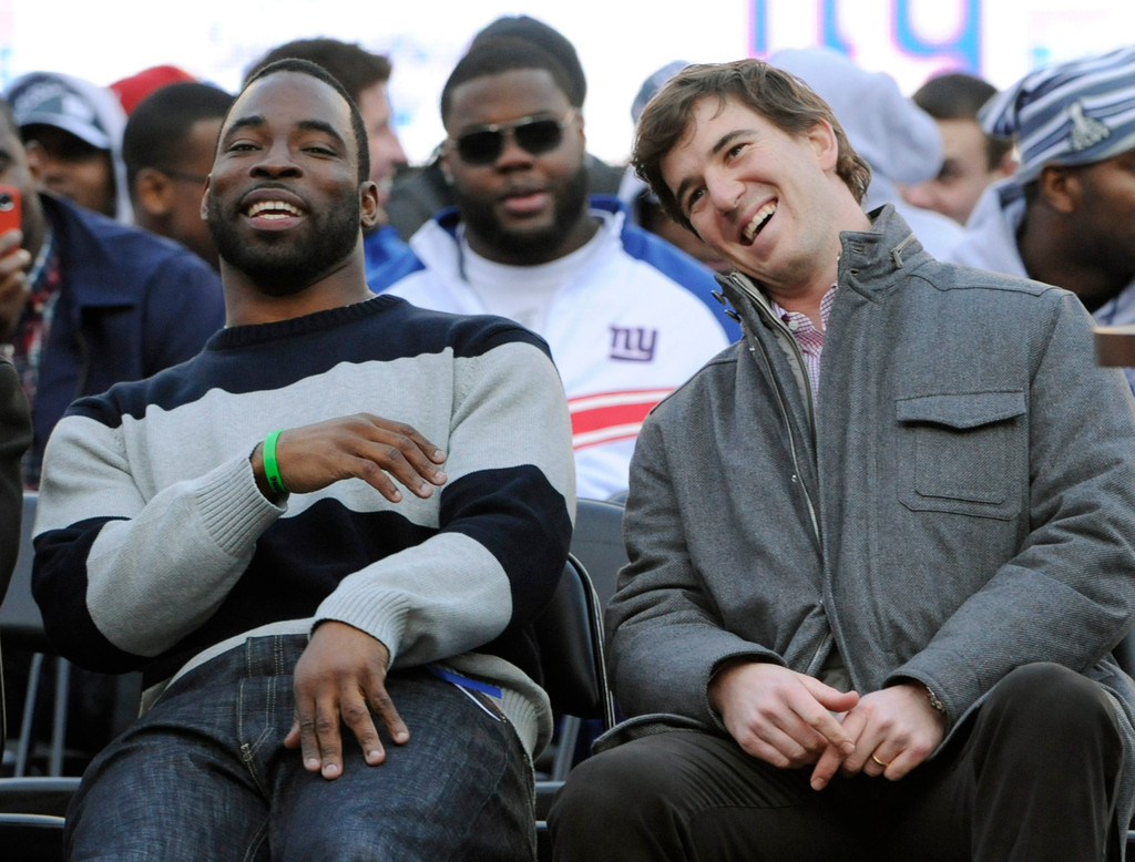 Justin Tuck & Sergio Brown at Super Bowl XLVI (AP)