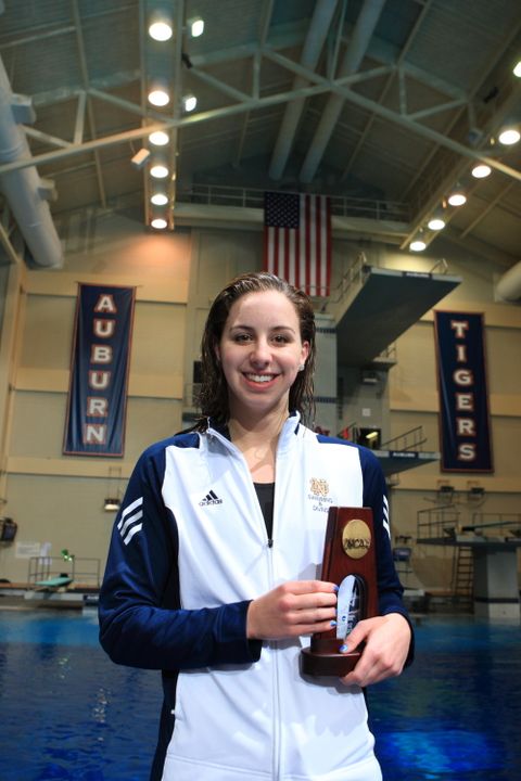 Kelly Ryan holds her All-America trophy after finishing seventh in the 200 back.