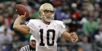 Notre Dame Sinks Navy Brady Quinn throws a pass during the first half of the game vs. Navy in Baltimore