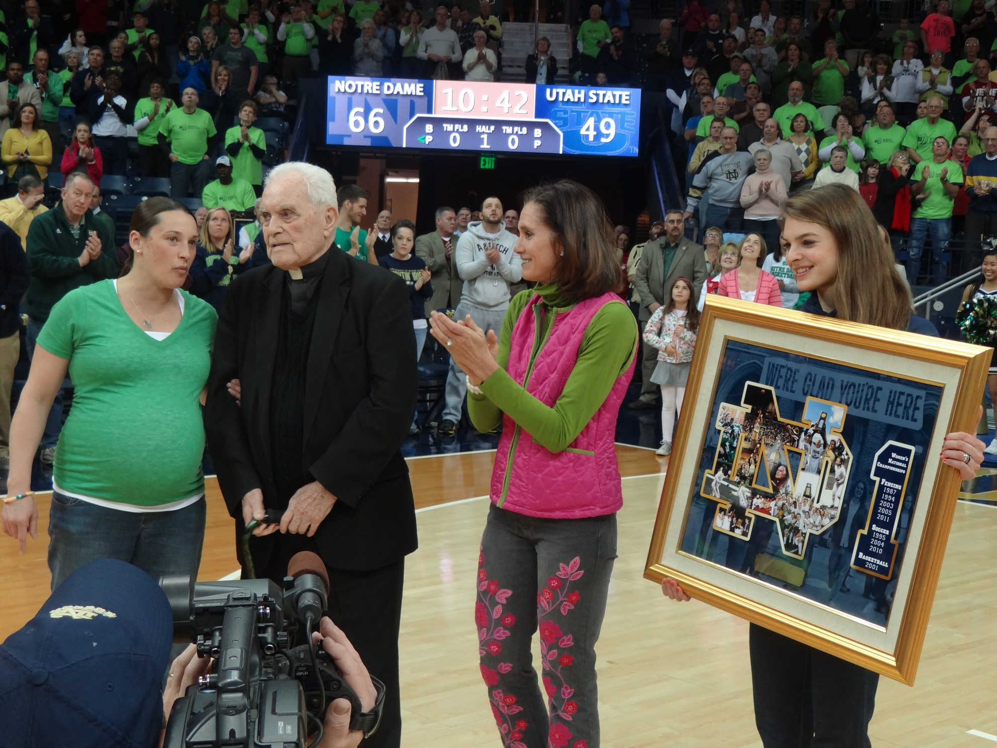 Notre Dame Athletics Holds Title IX 40th Anniversary Celebration Notre Dame president emeritus Rev. Theodore Hesburgh and Haley Scott DeMaria ('95)