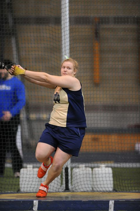Emily Morris (shown in the weight throw) set the Notre Dame women's indoor record in the shot put at the Blue &amp; Gold Invitational on Friday.