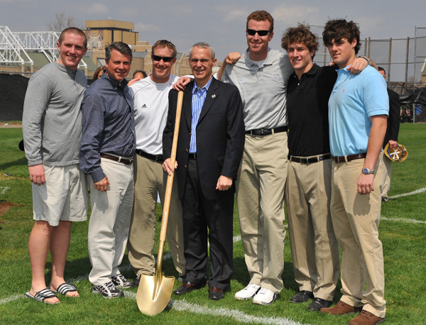 Notre Dame Opens Arlotta Stadium With Win Over Iroquois Nationals John Arlotta (in suit) and the Irish coaching staff at the stadium groundbreaking ceremony on April 18, 2008.