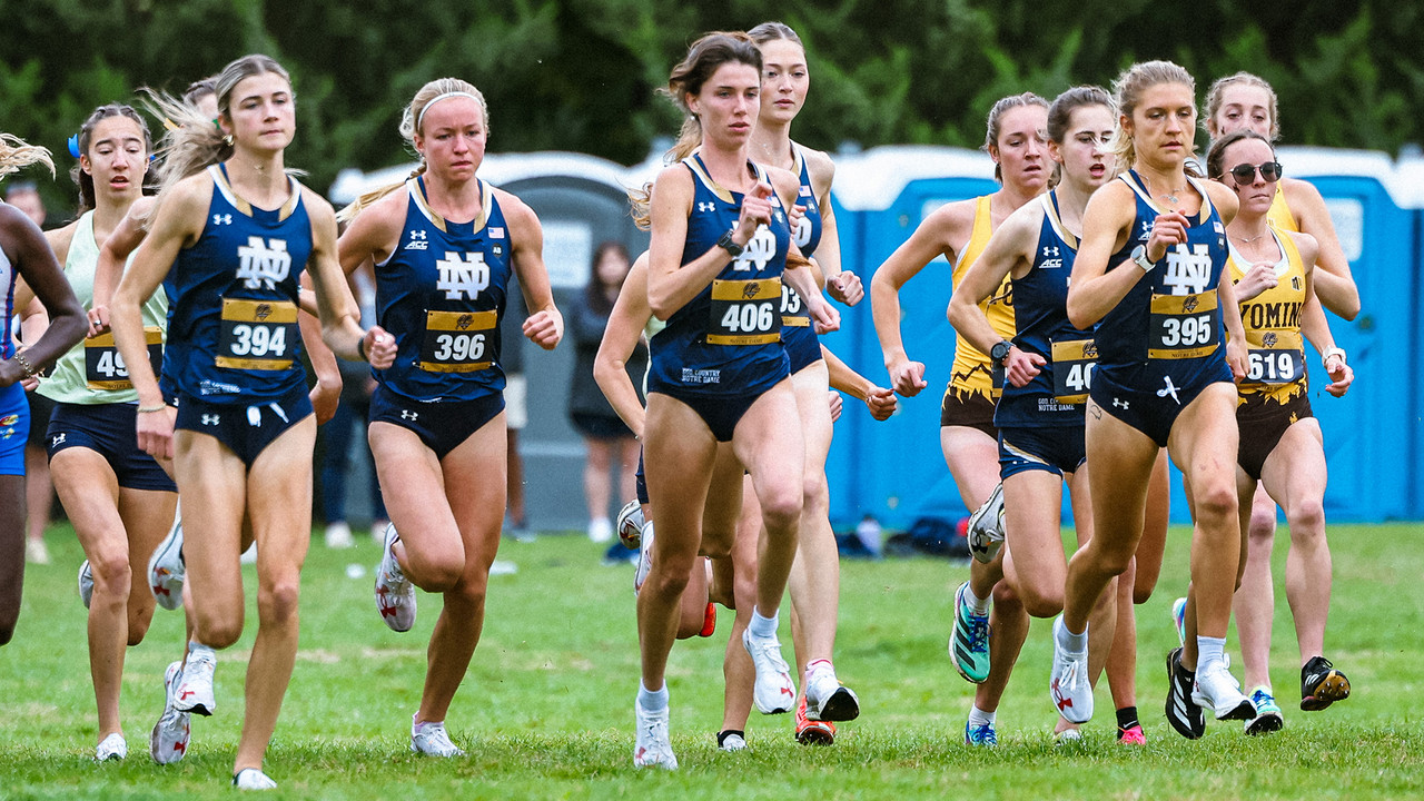 Members of the women's cross country team compete in a race.