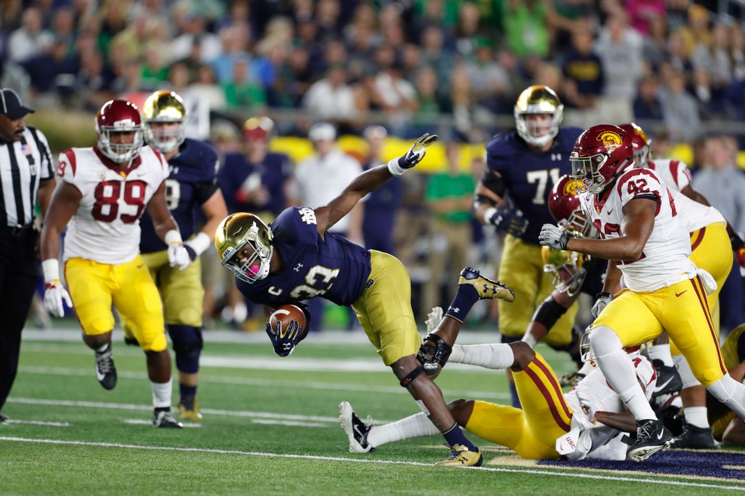 Oct 21, 2017; South Bend, IN, USA; Notre Dame Fighting Irish running back Josh Adams (33) runs with the ball against the Southern California Trojans at Notre Dame Stadium. Mandatory Credit: Brian Spurlock-USA TODAY Sports