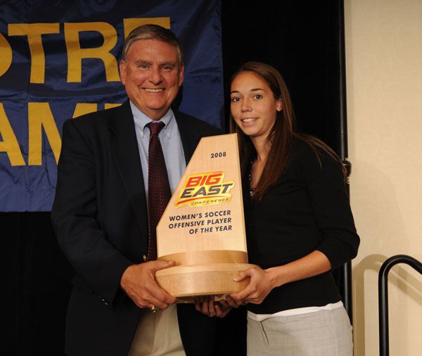 Senior All-America forward/Hermann Trophy candidate Kerri Hanks was named BIG EAST Offensive Player of the Year for the second time in three seasons on Thursday night, accepting this year's award from Notre Dame assistant athletics director (and BIG EAST women's soccer committee member) Tony Yelovich during ceremonies at the South Bend Marriott.