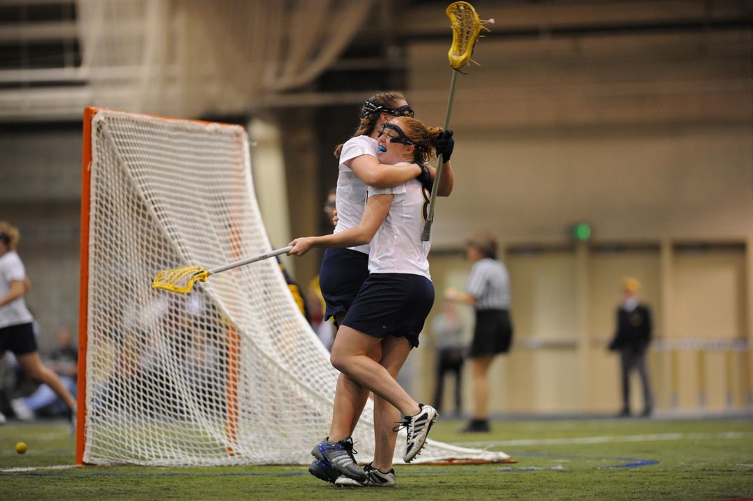 Shannon Burke and Kaitlin Keena celebrate a Notre Dame goal.  The duo Irish will host an opening round NCAA Tournament game versus Vanderbilt on May 10. The starting time has not been determined.