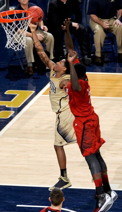 Eric Atkins lays it in during the fifth overtime against Louisville on Feb. 9.