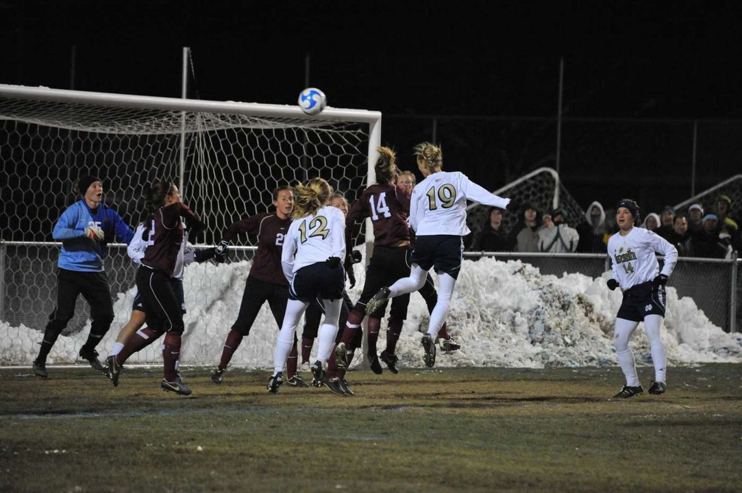 Carrie Dew (19) almost prevented overtime with this header attempt in the 58th minute, but her drive hit the cross bar.
