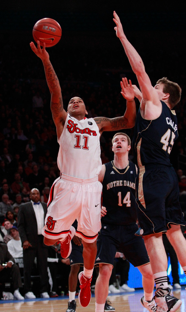 No. 20 Notre Dame Surprised By St. John's, 61-58 (AP)