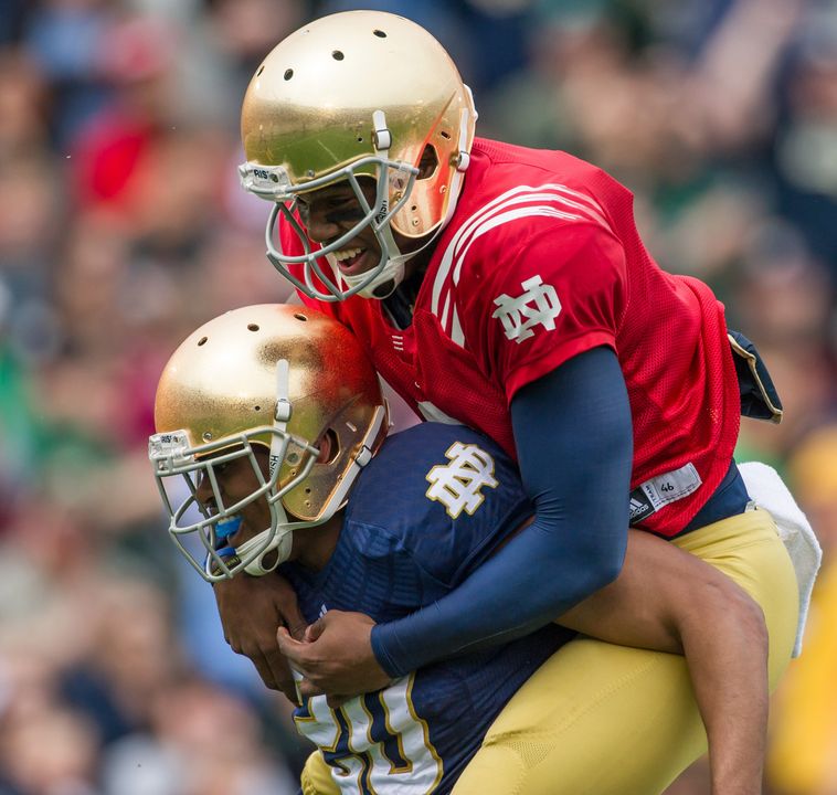 Malik Zaire celebrates with C.J. Prosise after they connected on a 39-yard touchdown.