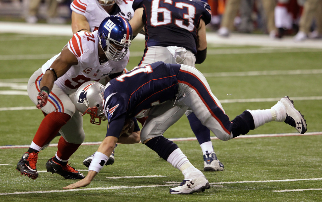 Justin Tuck & Sergio Brown at Super Bowl XLVI (AP)