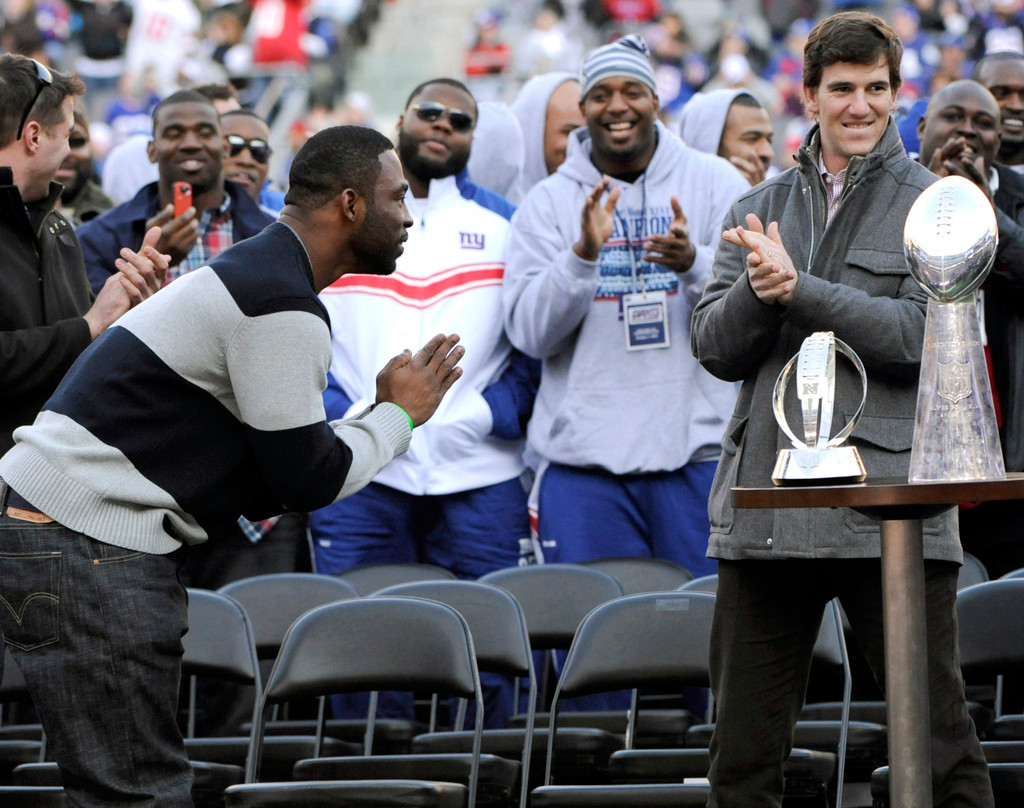 Justin Tuck & Sergio Brown at Super Bowl XLVI (AP)