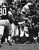 With Michigan State leading 10-0, Bob Gladieux (#20) grabbed a 34-yard pass from Terry Hanratty for Notre Dame's lone touchdown that changed the game's momentum.