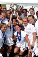 Notre Dame's Christie Shaner (top left), Kerri Inglis (holding trophy on left) and Brittany Bock (far right, center of frame) celebrate the U.S. Open Cup title with their FC Indiana teammates (all photos courtesy of Chad Weaver, Goshen News).