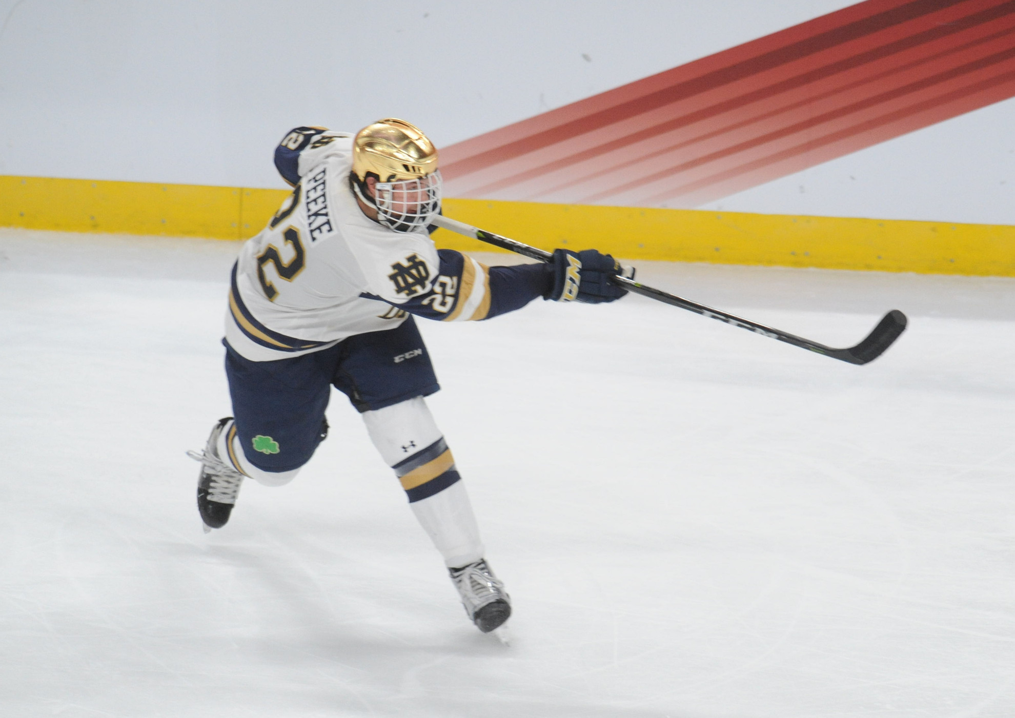 Irish Name 2018-19 Captains Apr 7, 2018; St. Paul, MN, USA; Notre Dame defenseman Andrew Peeke (22) takes a shot during the second period against the Minnesota Duluth Bulldogs in the 2018 Frozen Four college hockey national championship game at Xcel Energy Center. Mandatory Credit: Marilyn Indahl-USA TODAY Sports