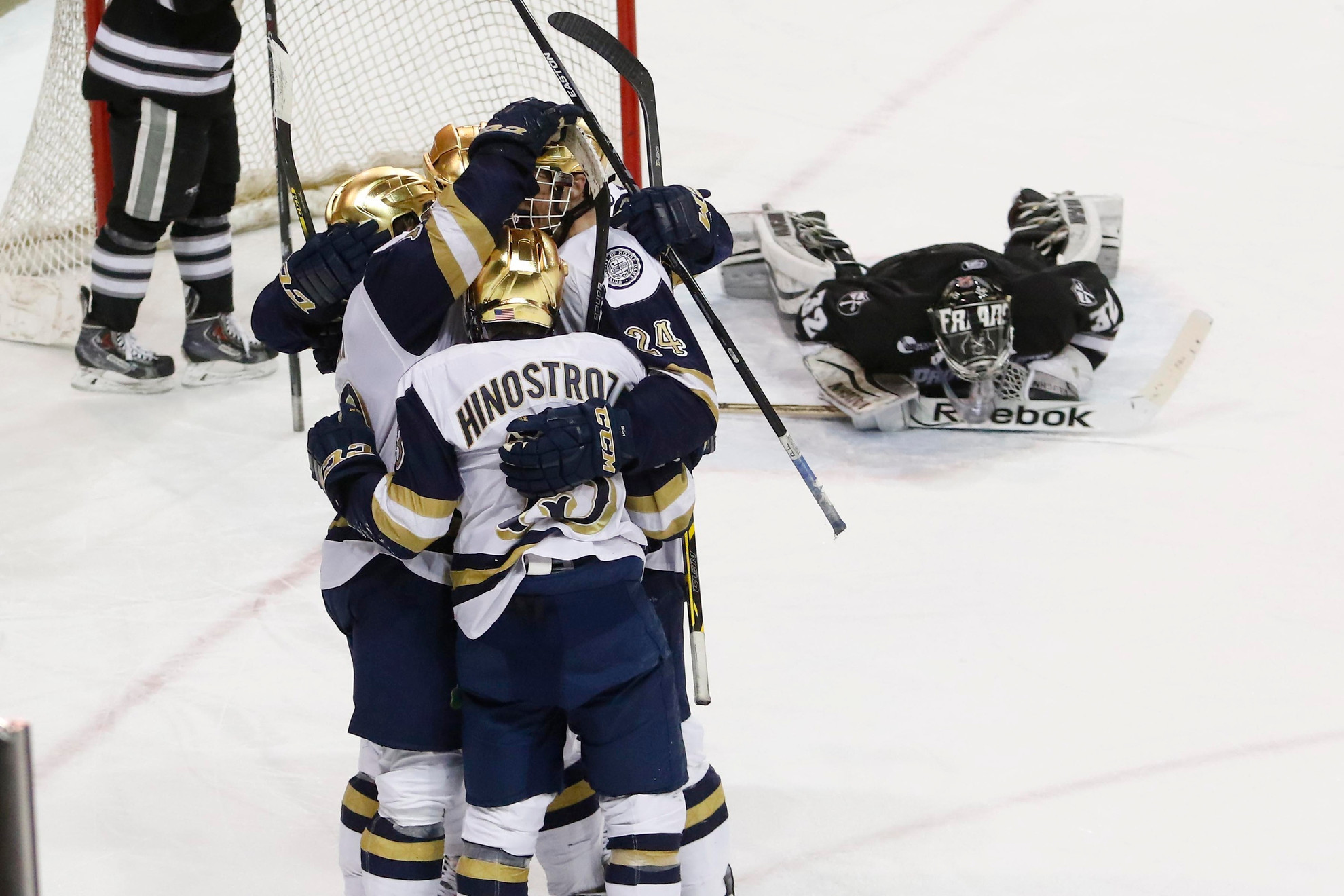 Petersen’s 38 Saves Lifts Irish to 2-0 Shutout of No. 10 Providence Vince Hinostroza is congratulated after his game-sealing goal with 1:39 to play in the game.