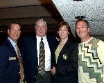 Bob Nagle (second from left) is congratulated by Jim Fraleigh (far left), Julie Doyle and Dave Poulin after receiving his Notre Dame honorary monogram (photos courtesy of 2003 honorary monogram recipient Mike Bennett and Lighthouse Imaging).