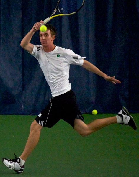 Junior Michael Moore improved to 2-0 at No. 6 singles on Sunday.